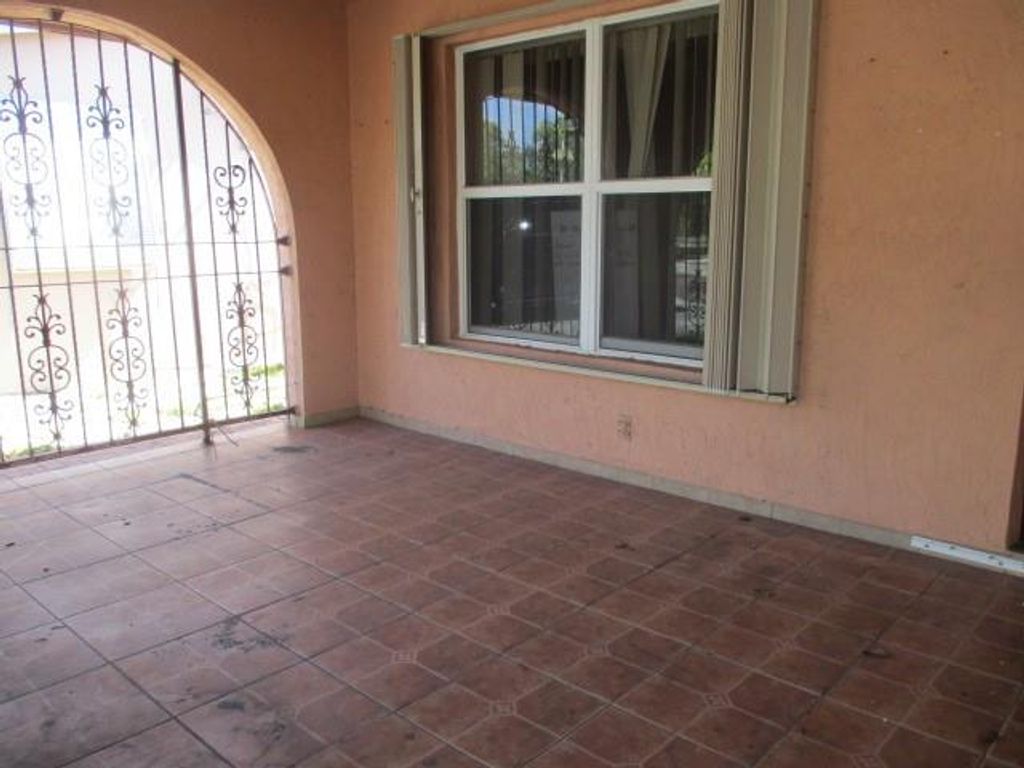 Photo of 926 N C Street, Lake Worth Beach, FL 33460 (MLS # F10434991)