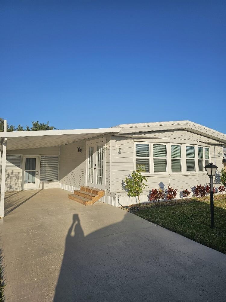 Photo of 2101 NE SAVANNAH Drive, Jensen Beach, FL 34957 (MLS # B26077155)