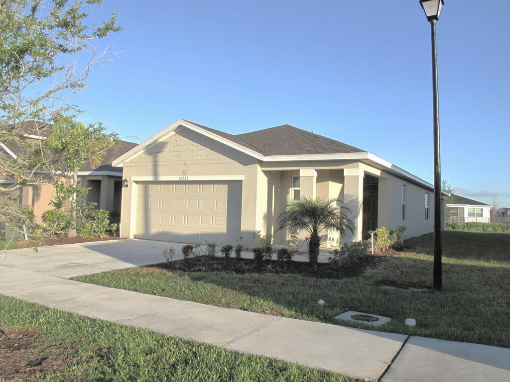 Photo of 12221 Nettuno Way, Port Saint Lucie, FL 34987 (MLS # B26051687)