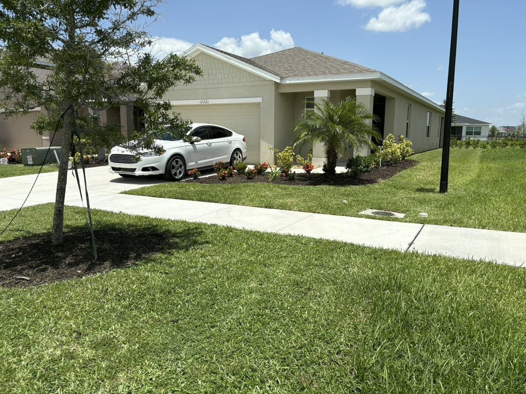 Photo of 12221 Nettuno Way, Port Saint Lucie, FL 34987 (MLS # B26051687)