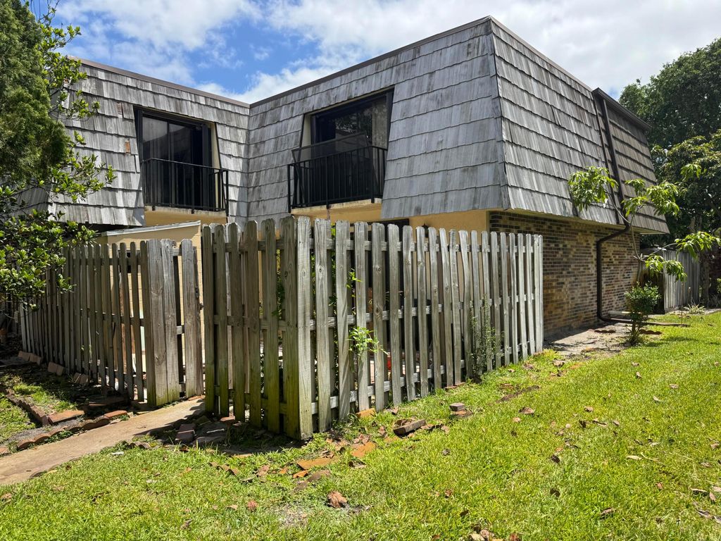 Photo of 1650 Forest Lakes Circle #D, West Palm Beach, FL 33406 (MLS # B26016420)