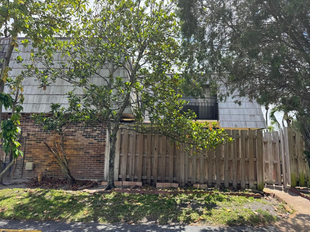 Photo of 1650 Forest Lakes Circle #D, West Palm Beach, FL 33406 (MLS # B26016420)