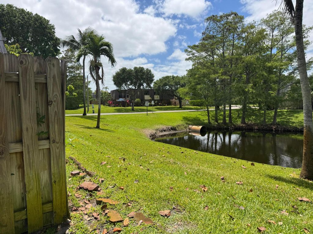 Photo of 1650 Forest Lakes Circle #D, West Palm Beach, FL 33406 (MLS # B26016420)