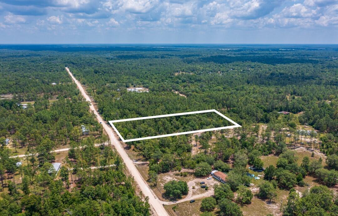 Welcome to your own piece of heaven in Levy County! 4.75acre. Nestled in the serene countryside of Archer, this beautiful lot presents an incredible canvas for crafting your dream home. Sprawling across 4.75 acres, this parcel of land holds boundless potential, inviting you to bring your vision to life.Alongside its idyllic setting, this property remains conveniently connected to modern amenities, including world-class healthcare facilities just a short drive away, approximately 30 minutes west of I-75 and Gainesville. Imagine waking up to the sounds of nature, surrounded by tranquility, yet knowing that everything you need is within reach.Don't let this opportunity slip away! Embrace the chance to create your own oasis in Levy County.