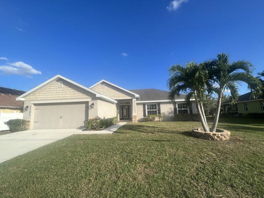Beautiful 4 bd 2 ba open floor plan vaulted ceiling home. Huge concrete patio is perfect for grilling. Open concept house with gorgeous kitchen. Also includes a screened lanai. Excellent location