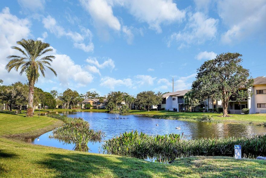 Experience serene lakefront living in Indian Pines! This beautifully maintained 2-bedroom, 2-bath condo offers tranquil water views from your screened patio and provides the convenience of a covered carport just steps from the community pool, clubhouse, and tennis courts. Inside, you'll enjoy the 2022 A/C system, full-size washer and dryer in a dedicated utility room, and generous storage throughout. The HOA fee includes cable, and the pet-friendly community welcomes two pets up to 15 lbs. Ideally located in the highly rated Martin County school district, Indian Pines is close to world-class golf, premier water sports, pristine beaches, boating, fishing, and all the best of Florida living.