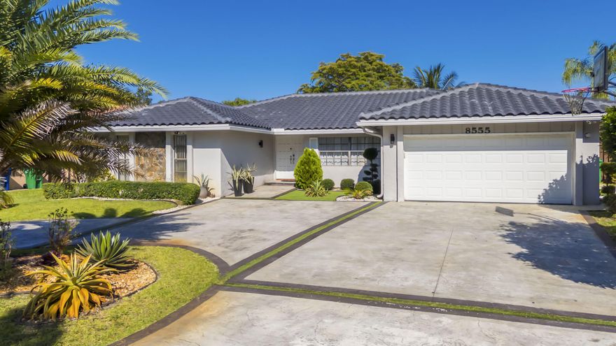 Welcome to this spacious 4-bedroom, 3-bathroom home offers over 2,600 square feet of living space on an oversized 11,000+ square foot lot. Designed for comfortable living and entertaining, the property features generous living areas, a desirable floor plan, and a private swimming pool perfect for enjoying the South Florida lifestyle year-round. The home also includes a 2-car garage and a brand-new roof, providing added value and peace of mind. The expansive backyard offers plenty of space for outdoor gatherings, recreation, and relaxation. Conveniently located near schools, parks, shopping, dining, and major roadways. Don't miss this opportunity to own a beautiful pool home in the heart of Coral Springs!