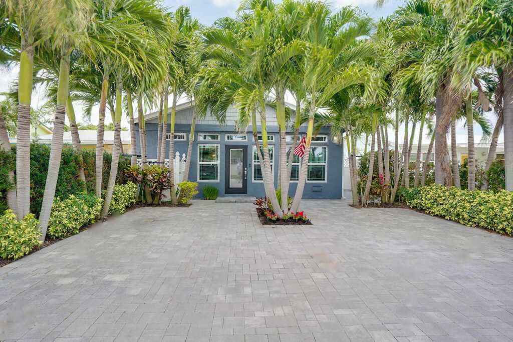 Photo of 26 Aqua Ra Drive, Jensen Beach, FL 34957 (MLS # R10959367)
