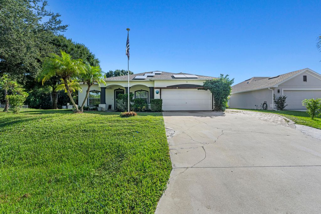 Photo of 1302 Coverbrook Lane, Sebastian, FL 32958 (MLS # R11166103)