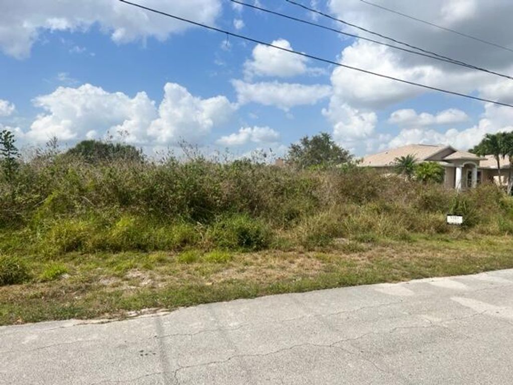 Photo of 4262 SW Jarmer Road, Port Saint Lucie, FL 34953 (MLS # R10871373)