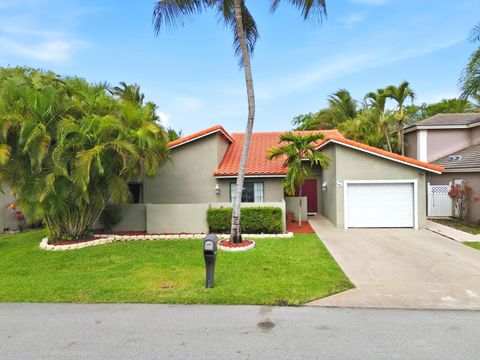 Photo of 263 NW 48th Avenue, Deerfield Beach, FL 33442 (MLS # B26016788)