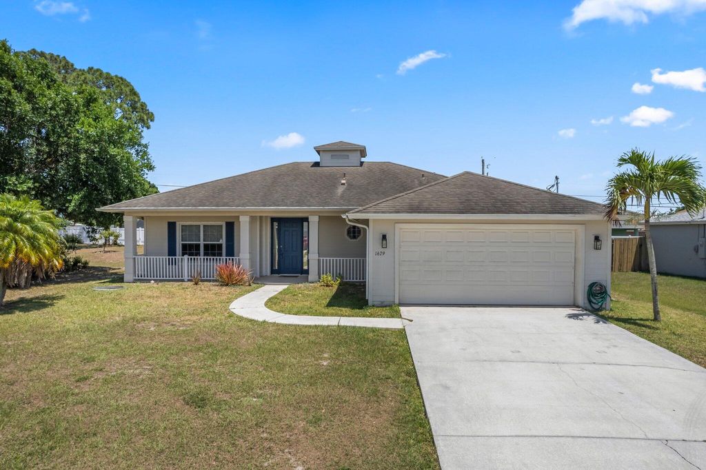 Photo of 1679 SW California Boulevard, Port Saint Lucie, FL 34953 (MLS # R10983455)