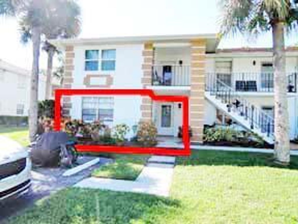 Photo of 1221 S Lakes End Drive #Apt A-1, Fort Pierce, FL 34982 (MLS # R10753583)