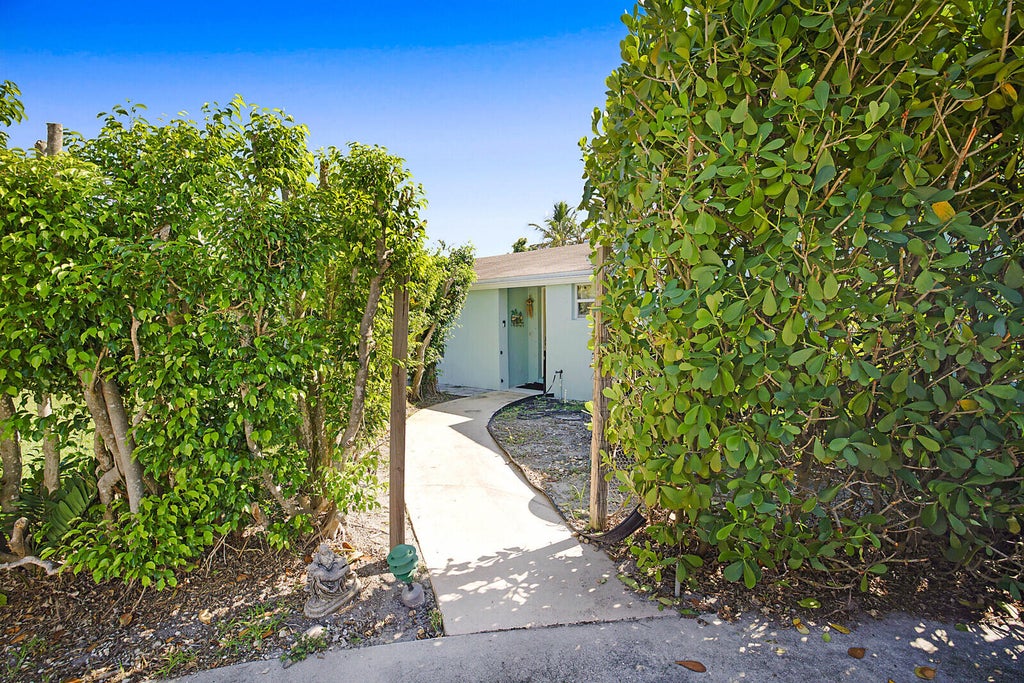 Photo of 391 W Riverside Drive, Tequesta, FL 33469 (MLS # R11023674)
