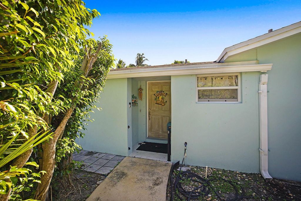 Photo of 391 W Riverside Drive, Tequesta, FL 33469 (MLS # R11023674)