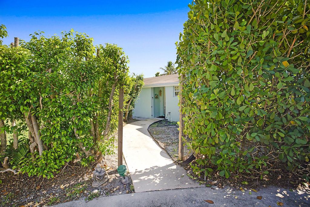 Photo of 391 W Riverside Drive, Tequesta, FL 33469 (MLS # R11023674)