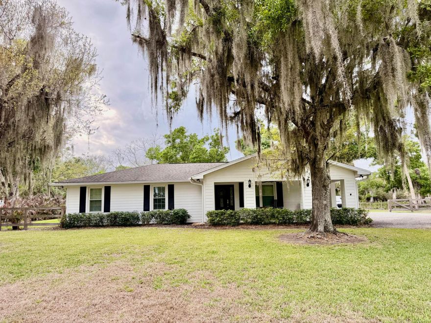 A RARE FIND! Elegant Farmhouse design -SW area - ONE ACRE! (2008) 2 Bd/ 2 Ba, HardyBoard siding. 14x25 Florida Room and 20x29 covered patio.  Gracious views, lovely privacy!  Open concept. Impeccably remodeled throughout - island kitchen, farm sink, special lighting. Grand master suite with oversized shower, double sinks and 10x11 walk in closet. 1200 SF metal bldg w/ RV carport (2023). Stately above ground pool enhanced by the upper deck w/pavillion.  Storage shed and Cadillac chicken coup!  3 Board fencing. 5 Minutes to Publix -EXCELLENT LOCATION!  Pristine in Every Way! Come home to your HAPPY HOME!   Dimensions are approximate, must measure for exact. **Additional Photos coming soon**