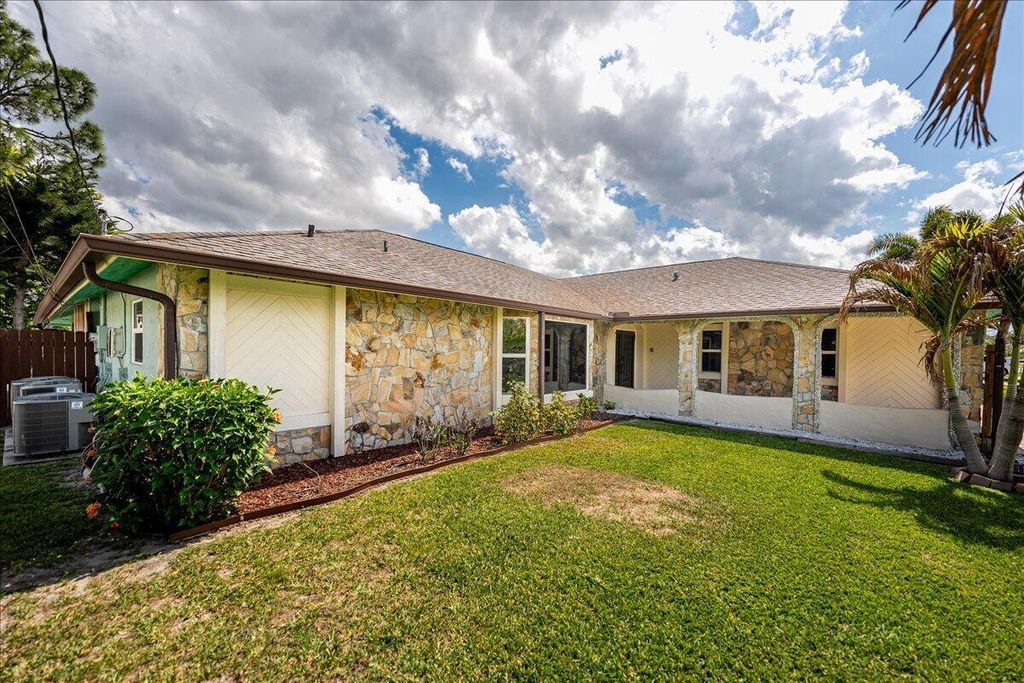 Photo of 1326 SW Bartell Avenue, Port Saint Lucie, FL 34953 (MLS # B26020137)