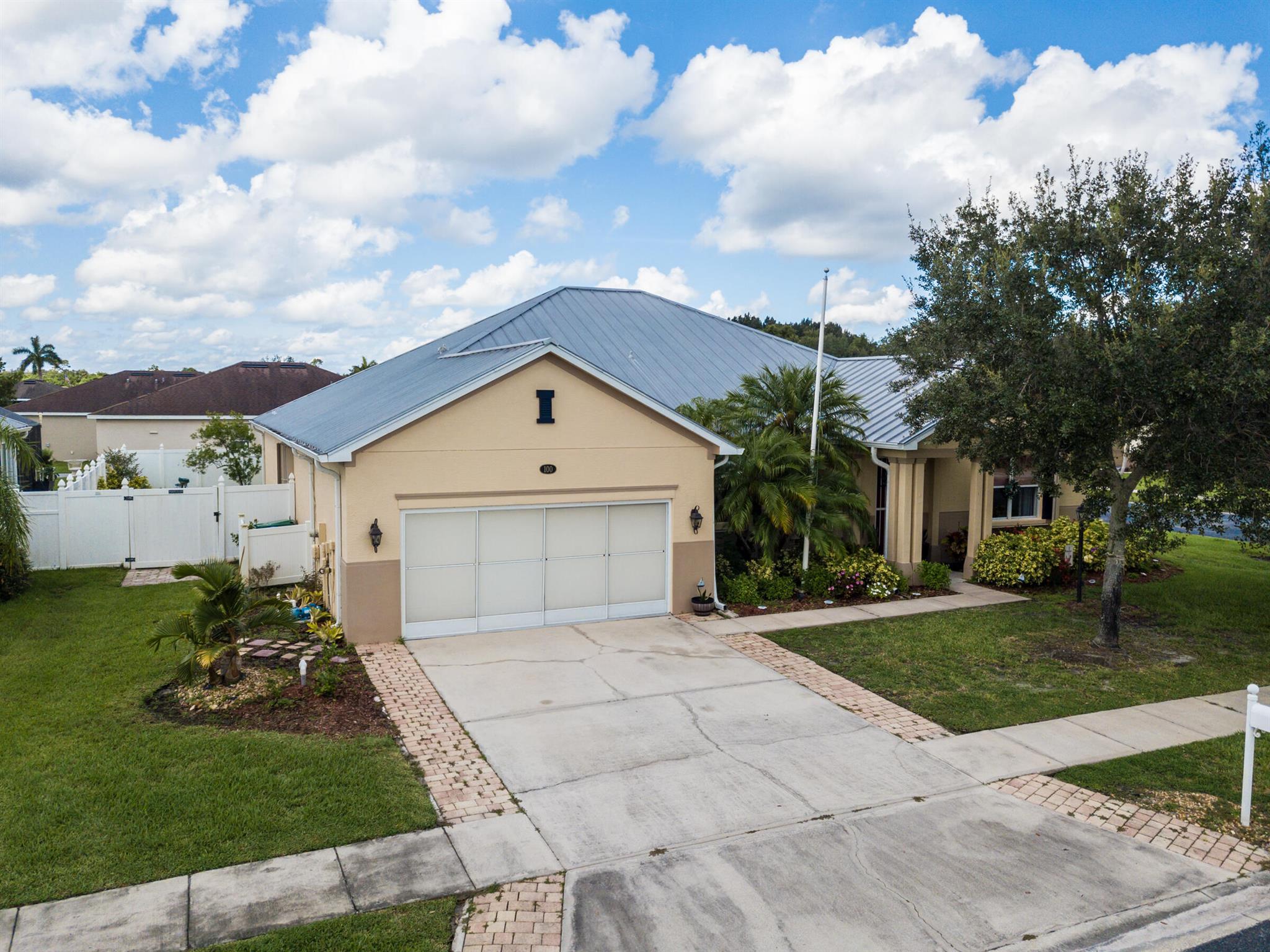 Rare Sebastian River Landing gem. One of the largest at a great $/SF. 4 bed/2 ba home elegantly & efficiently appointed. Cherry wood & tile floors; crown molding; baseboard; 9' ceilings; ample storage; laundry room; 2-car garage has overhead storage & is screened for cool weather use; metal roof; accordion shutters; raingutters; privacy fence, corner lot. Open space + a flex space for formal dining room or living room - your choice. Gorgeous kitchen with tall cherry cabinets, center island, granite countertops, SS appliances, walk-in-pantry, pass-thru window to screened-in lanai. The super-size owner's suite has large en-suite bath with soaking tub & sep. walk-in shower + huge walk-in closet. Low HOA fee! Community pool, clubhouse, tennis & basketball courts. Close to shopping & salt life