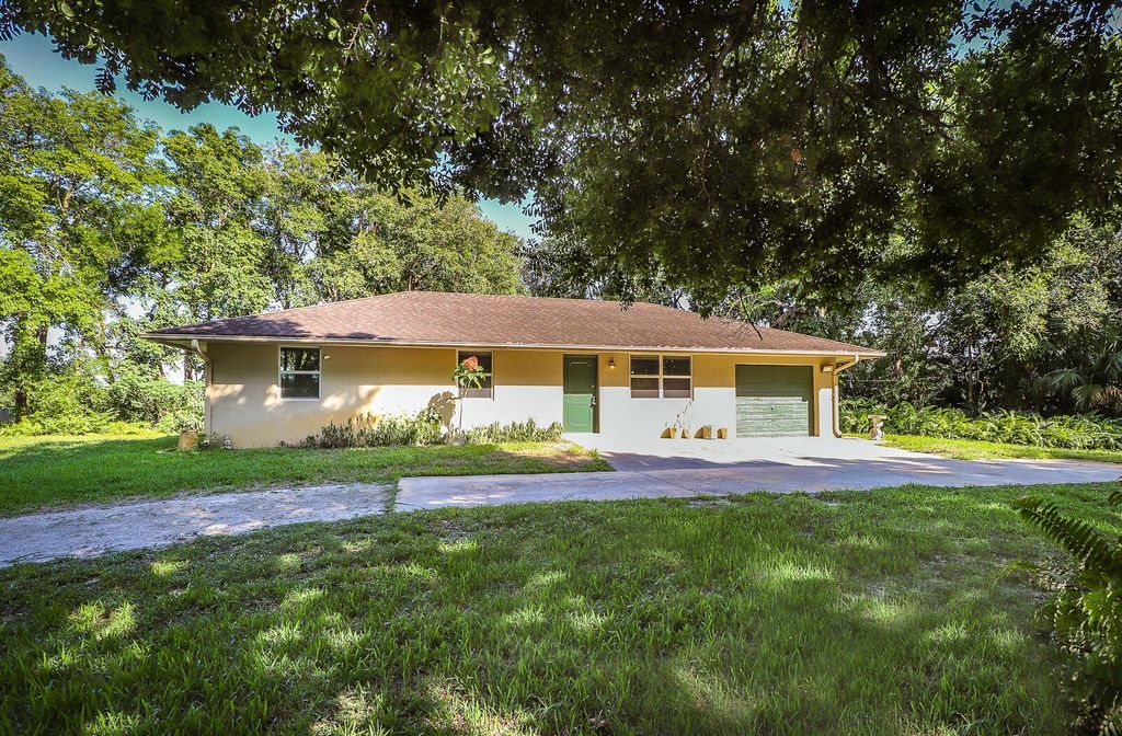 Photo of 16468 75th Avenue N, Palm Beach Gardens, FL 33418 (MLS # R10989400)