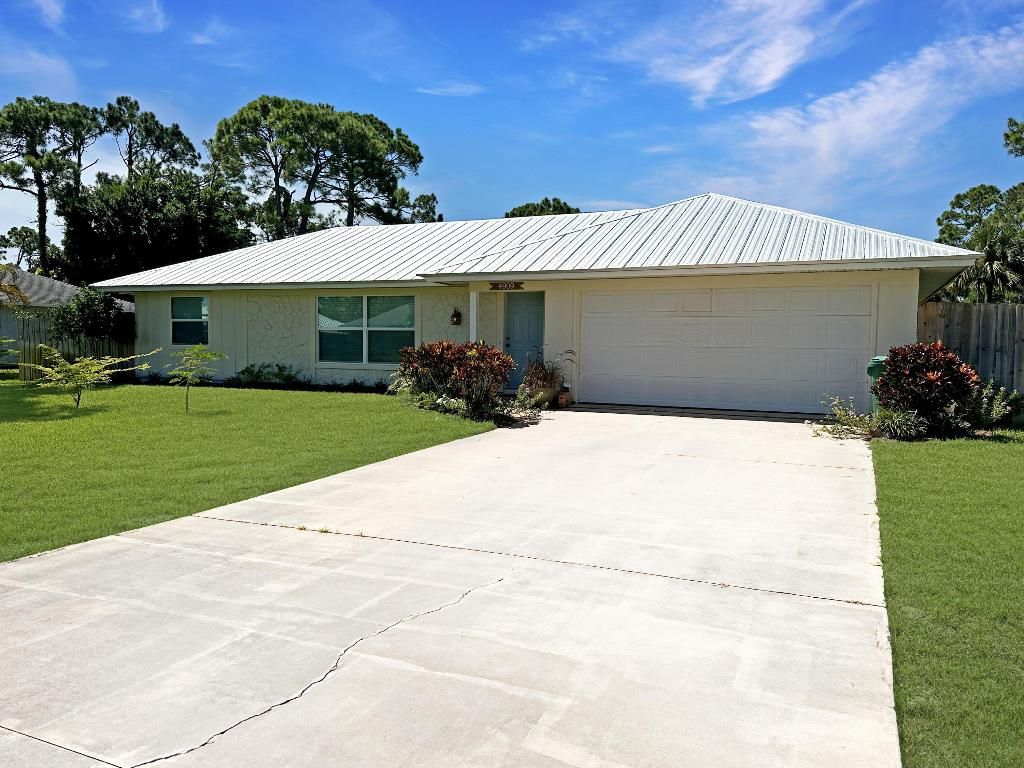 Photo of 4909 Paleo Pines Circle, Fort Pierce, FL 34951 (MLS # R11113991)
