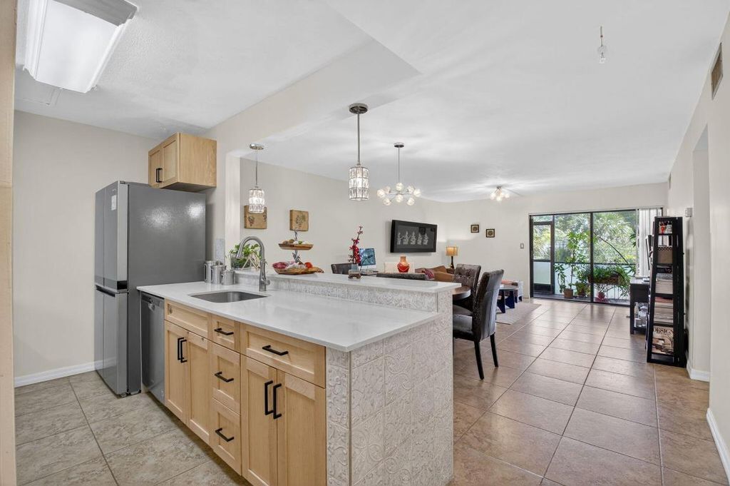 Photo of 900 SW 9th Street Circle #102, Boca Raton, FL 33486 (MLS # R11108351)