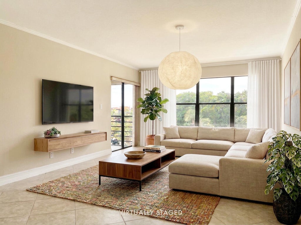 Photo of 2306 S Cypress Bend Drive #420, Pompano Beach, FL 33069 (MLS # B26069640)