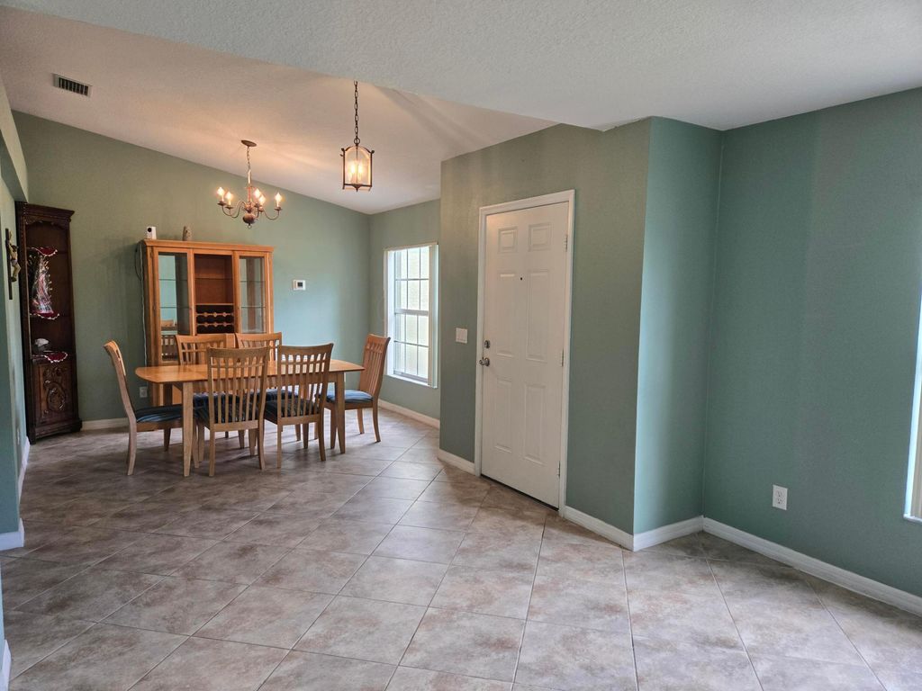 Photo of 3190 SW Martin Street, Port Saint Lucie, FL 34953 (MLS # R11034768)