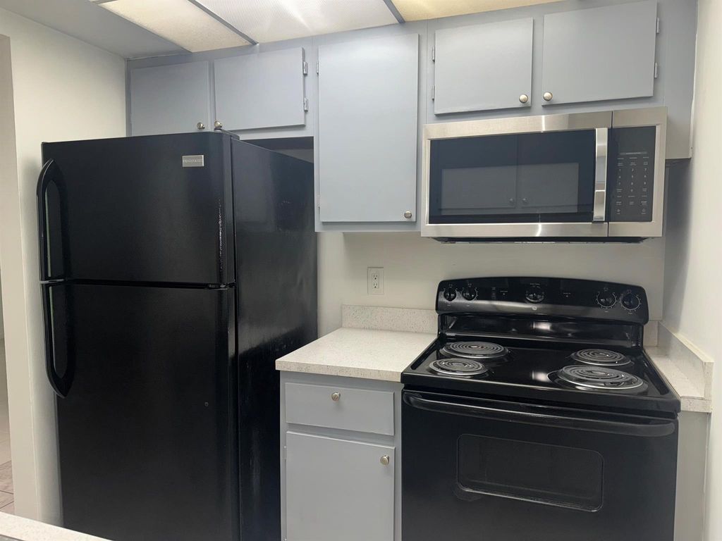 Photo of 1758 Abbey Road #103, West Palm Beach, FL 33415 (MLS # R11095484)