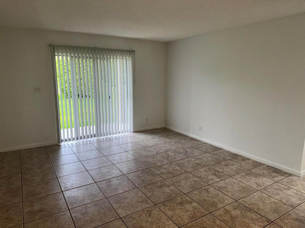 Photo of 1758 Abbey Road #103, West Palm Beach, FL 33415 (MLS # R11095484)