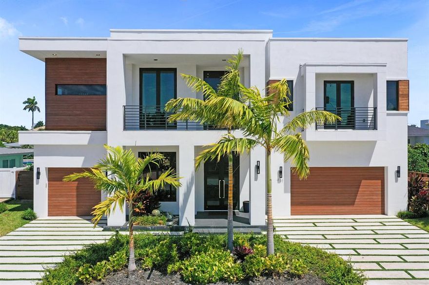 Stunning, turn-key 6 bedroom home in the heart of desirable Boca Harbor. This waterfront beauty impresses with a large gourmet kitchen, Dacor appliances, gas stove, gorgeous oak built-in cabinets, an inviting living  and dining room, 12 foot ceilings, 2 laundry rooms, fireplace, an elevator, 3 car garage, 6 en-suite, spacious bedrooms as well as an office 6.5 baths including a convenient cabana bath. The oversized master suite is complete with morning bar, spa like master bathroom and generous walk-in closet, balcony and a beautiful water view. Outdoors the home boasts a lovely summer kitchen, a salt water pool and spa and plenty of space for entertaining. The property comes fully furnished with brand new designer furniture. Bring your boat and enjoy the beautiful Florida lifestyle.