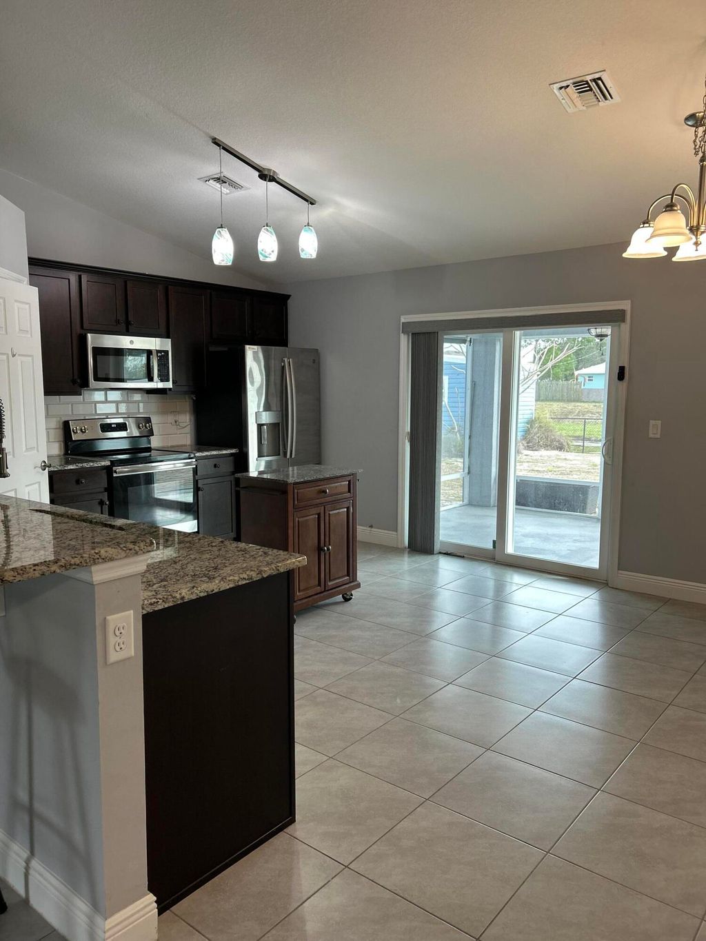 Photo of 1114 SW Bellevue Avenue, Port Saint Lucie, FL 34953 (MLS # B26001044)