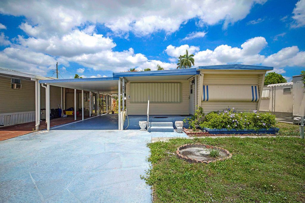 Photo of 8919 Palm Street, Boynton Beach, FL 33436 (MLS # R11092989)