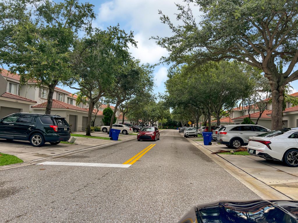 Photo of 5309 Crossing Rocks Court, Riviera Beach, FL 33407 (MLS # R10994171)