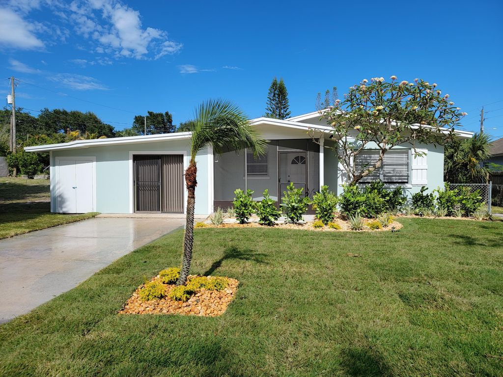 Photo of 1775 NE 22nd Drive, Jensen Beach, FL 34957 (MLS # R10798079)
