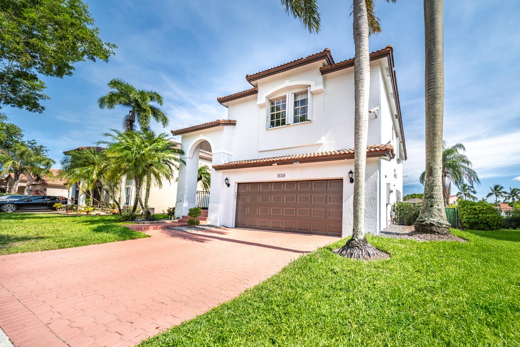 Photo of 18438 NW 11TH Street, Pembroke Pines, FL 33029 (MLS # B26090063)