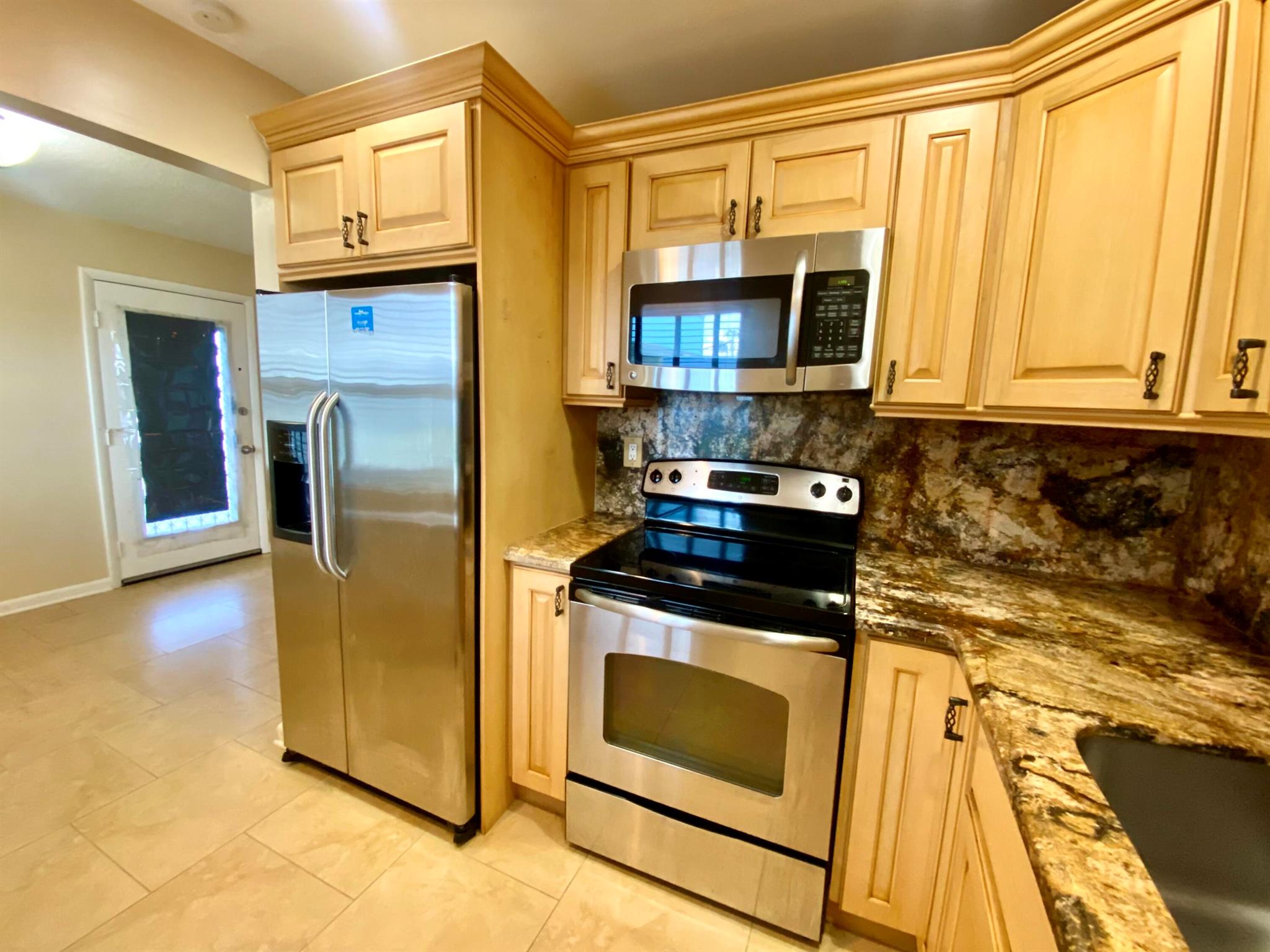 Beautiful updated 2/2 Condo with golf and water view from the living room. Tile flooring throughout, both bathrooms have been updated as well. Enclosed balcony with washer/dryer. This community has 2 golf courses, 3 clubhouses, In/outdoor pools, clubs, pickleball, tennis, courtesy buses, near place of worship.