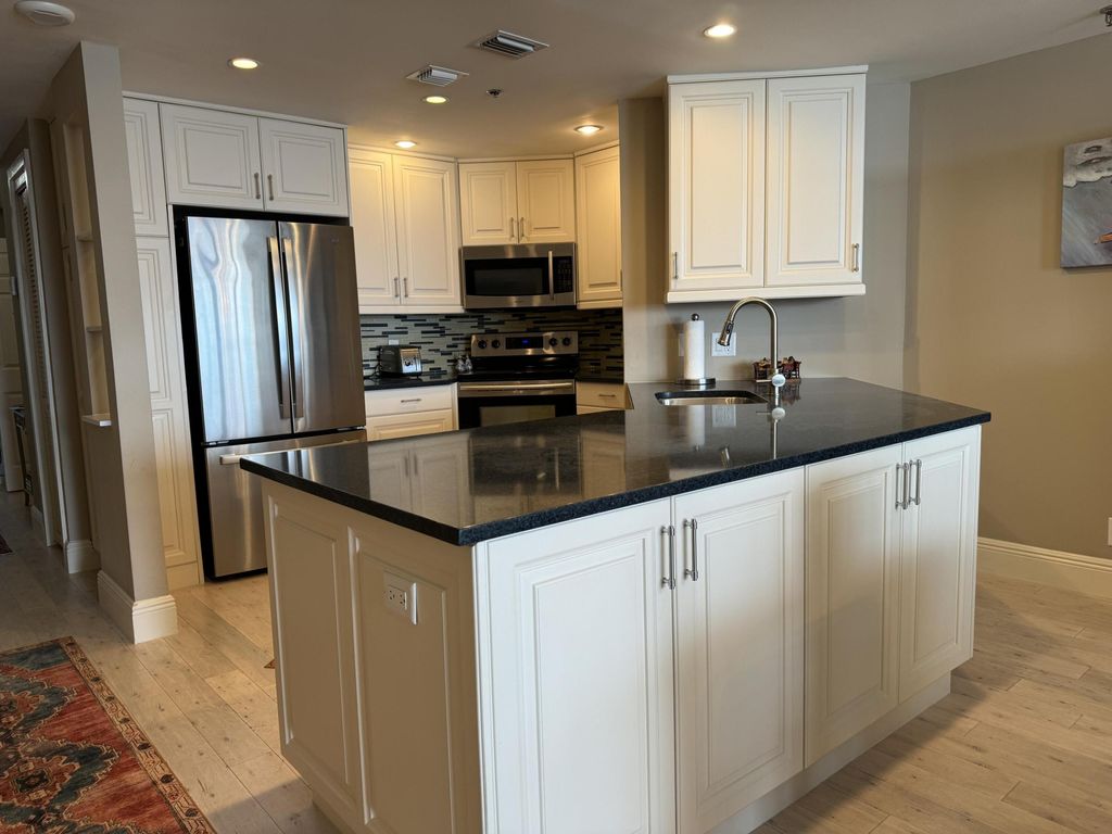 Photo of 11370 Twelve Oaks Way #315, North Palm Beach, FL 33408 (MLS # R10970993)