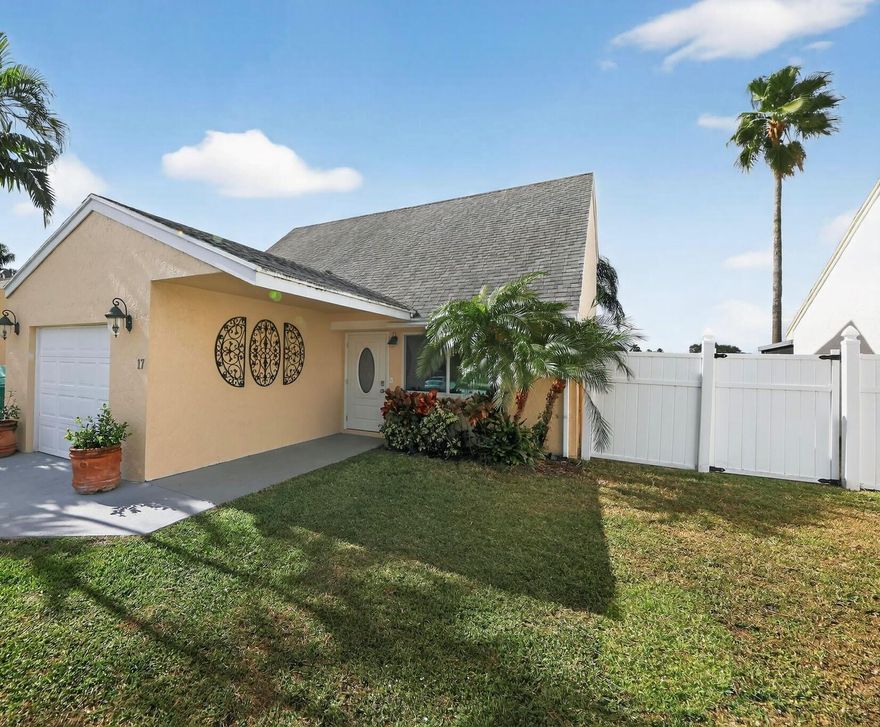 Lakefront & Fully Remodeled! This 4-bedroom, 2-bath home in a desirable Boynton Beach community features a modern open layout, brand-new finishes, and a chef's kitchen with quartz counters and stainless steel appliances. Most recent upgrades include new AC, windows, doors (2024), and fresh paint. Enjoy serene lake views and a walking trail from the spacious Florida Room with a side yard designed for outdoor entertaining. The community pool was just redone and has one of the lowest HOAs in Palm Beach County, plus tennis courts. Convenient location near shopping, dining, parks, and major highways. Move-in ready!