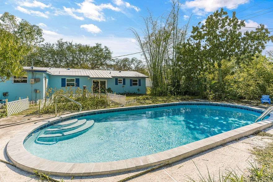 Prime Vero Beach location. This beautifully updated CBS home features 4 bedrooms, 2 bathrooms, a desirable split floor plan, fresh paint inside & out, a swimming pool w/ new surface, impact windows/doors, metal roof, 2021 AC w/ UV light & tile flooring throughout. Ideal as a primary residence, vacation retreat or investment property. Enjoy a generous sized living room, dining area, modern kitchen, fenced yard with fruit trees & amazing gardening in the front/backyard. Close proximity to restaurants, shopping & 12 minutes or less to the beach.