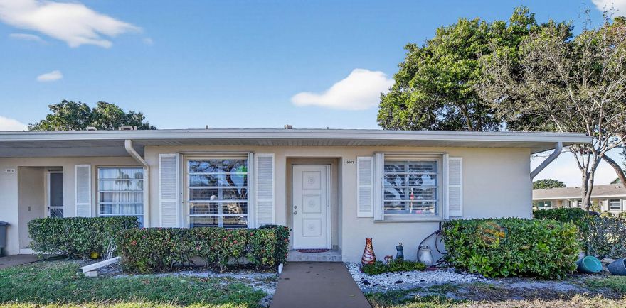 YOU WILL ABSOLUTELY LOVE THIS CORNER UNIT!  IT HAS BEEN FULLY RENOVATED!
THIS ELEGANT LARGE CORNER UNIT IS MOVE IN READY FOR YOU. NEWLY PAINTED!
 Large open floor plan with extra finished sunroom.   Beautiful brand-new faux wood laminate luxury flooring  throughout the unit. New granite countertops in the open kitchen with full size W/D . The unit is bright and sunny and features new  custom plantation shutters on every window providing a modern, elegant look. The master bedroom has an extra walk-in closet.Hurricane shutters. An active 55+ community with a gorgeous pool area, tennis, shuffleboard, bocci ball, and large clubhouse with many activities. Low HOA includes cable, internet, water and gated with 24hr callbox. New underground irrigation & landscaping in progress. 
5 yr roof. Special Assessment to install new underground irrigation and new landscaping in progress, as well as a new roof on the clubhouse has been paid in full.  Low HOA which includes cable, internet, water and gated with a 24hr callbox. Information is deemed to be reliable.