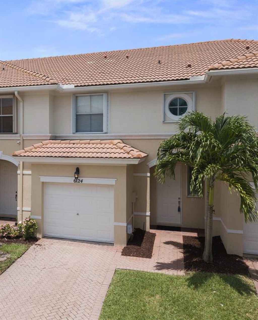 Photo of 6124 Seminole Gardens Circle Cir, Riviera Beach, FL 33418 (MLS # R10737061)