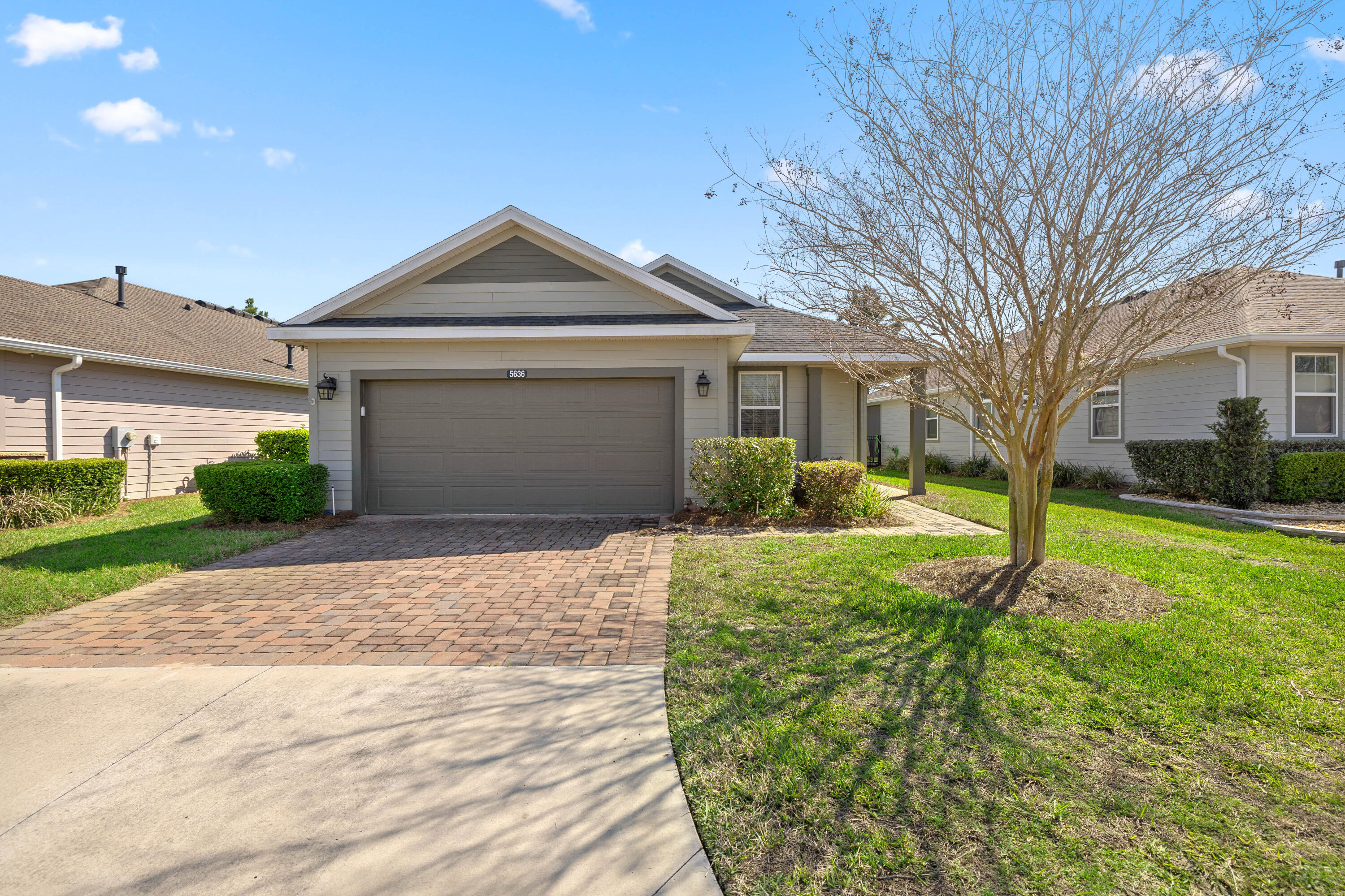 **Naples Model in Ocala Preserve with NO CDD FEE - Located on a quiet Cul-De-Sac Living** Discover this beautiful Shea-built Naples model in the highly sought-after 55+ area. Featuring 3-bedroom, 2-bathroom home with a 2-car garage and a tranquil backyard that's fully fenced offering the perfect blend of privacy and serenity. Step inside to an **open-concept floor plan** with modern finishes, spacious living areas, and abundant natural light. The primary suite provides a peaceful retreat with an ensuite bath and walk-in closet, while the additional bedrooms provide versatility for guests or a home office. Ocala Preserve is designed for an **active lifestyle**, featuring **a resort-style pool, a lap pool, pickleball courts, scenic walking trails, and an on-site restaurant ''
