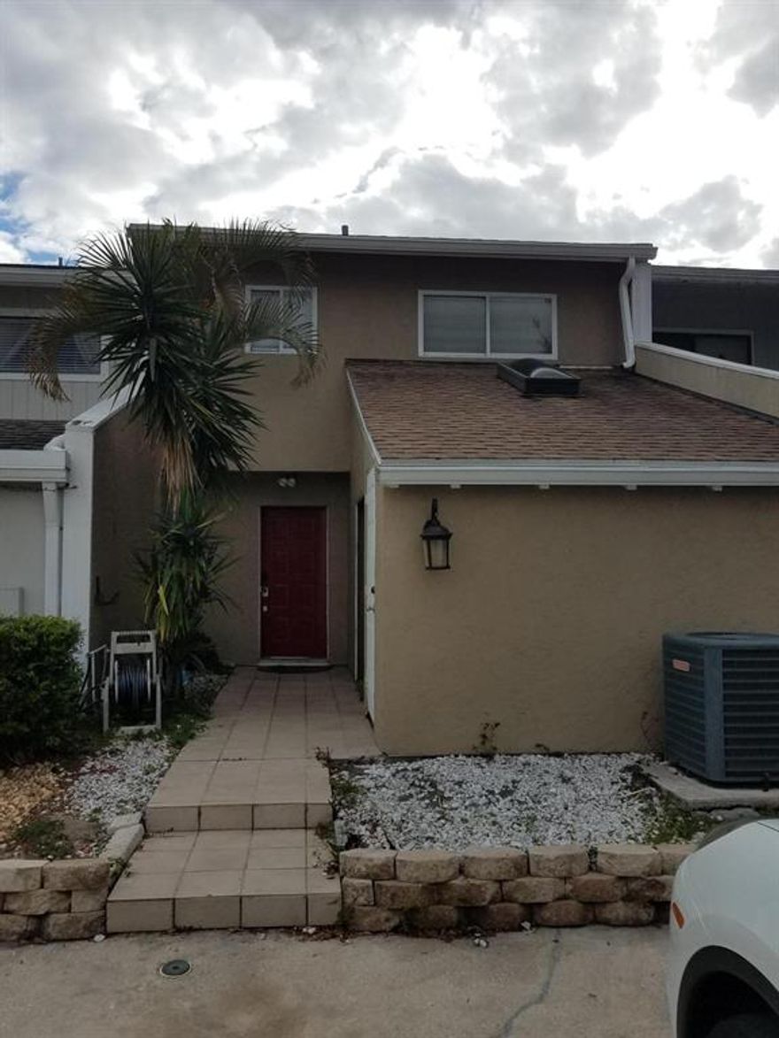 This lake front townhome has an upgraded kitchen with granite counter top and a laminate floor thru out.  It has fresh paint and needs a bit of TLC to your taste. The 3rd bedroom has been opened to make a large master bedroom.