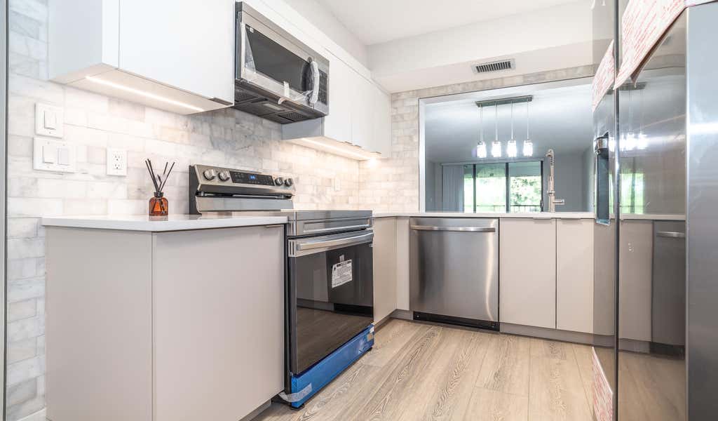 Photo of 1850 Homewood Boulevard #216, Delray Beach, FL 33445 (MLS # R11024417)