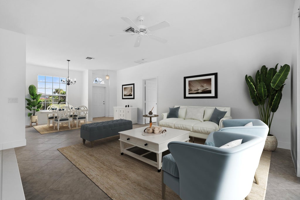 Photo of 565 SW Feldman Avenue, Port Saint Lucie, FL 34953 (MLS # R11133588)