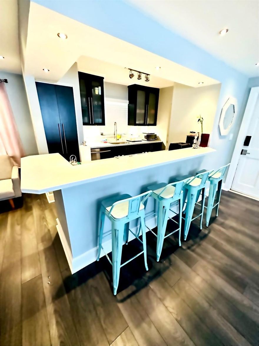 Beautifully fully furnished remodeled 1-bed, 1.5-bath unit with modern finishes, great natural light, impact windows, and first-floor entry (no stairs/elevator) plus assigned parking. Just 5 minutes from the beach, next to The Galleria Mall, and close to groceries, restaurants, and shops. Community pool. Minimum 6-month lease preferred, but shorter stays considered at a special rate. Easy to show.