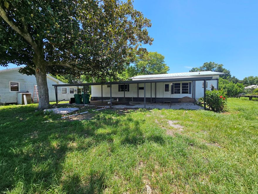Treasure Island~Affordable waterfront living with access to desirable Lake Okeechobee and no HOA! This 4Bed/2Bath Manufactured Home features a brand-new metal roof and is on public water and septic. Located in a great area, it's perfect for first-time buyers or investors. Enjoy peaceful water views, excellent fishing and boating, and tons of potential. Priced to sell. Measurements are approximate.