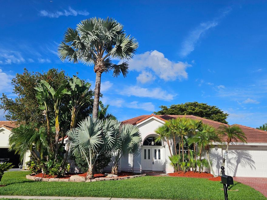 3 bedroom / 2 bath Single Family Home located in The Hampton Park Enclave, Boca Winds Community. Double French door entry to an enclosed pool and lake views surrounded by a lushly landscape. Living areas open to kitchen overlooking serene water views. Formal dining room with arched window, plenty of natural light. Master bedroom with laminated floors & pool view. Master bathroom with shower and separate roman bathtub. Spacious walk-in closet. Crown molding throughout, laundry tub, 2 car garage. Located in a highly desirable area with A+ rated schools. Community offers 2 swimming pools, tennis court, basketball court, 3 playgrounds  & Clubhouse. Property can be rented after 12 months of ownership.