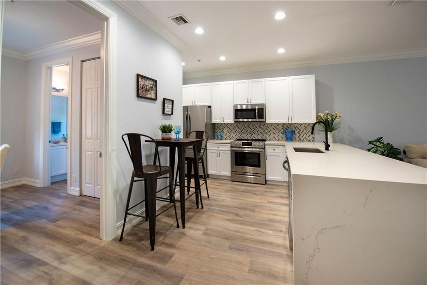 MOVE RIGHT IN IN THIS STUNNING TOWNHOME OVERLOOKING THE LUSHLY LANDSCAPED POOL AREA.  KITCHEN HAS BEEN UPDATED WITH QUARTZ COUNTERS INCLUDING A WATERFALL, GLASS TILE BACKSPLASH AND NEW S/S APPLIANCES!  THE FIRST TWO LEVELS INCLUDING STAIRCASE HAVE BEEN DONE RECENTLY WITH WIDE PLANK, VINYL, WATER PROOF FLOORS.  BEDROOMS ON THE THIRD LEVEL HAVE BEEN NEWLY CARPETED. WALK TO CLUBS, BARS AND FINE RESTAURANTS! STUNNING TOWNHOME IN WILTON MANORS JUST OFF WILTON DRIVE!